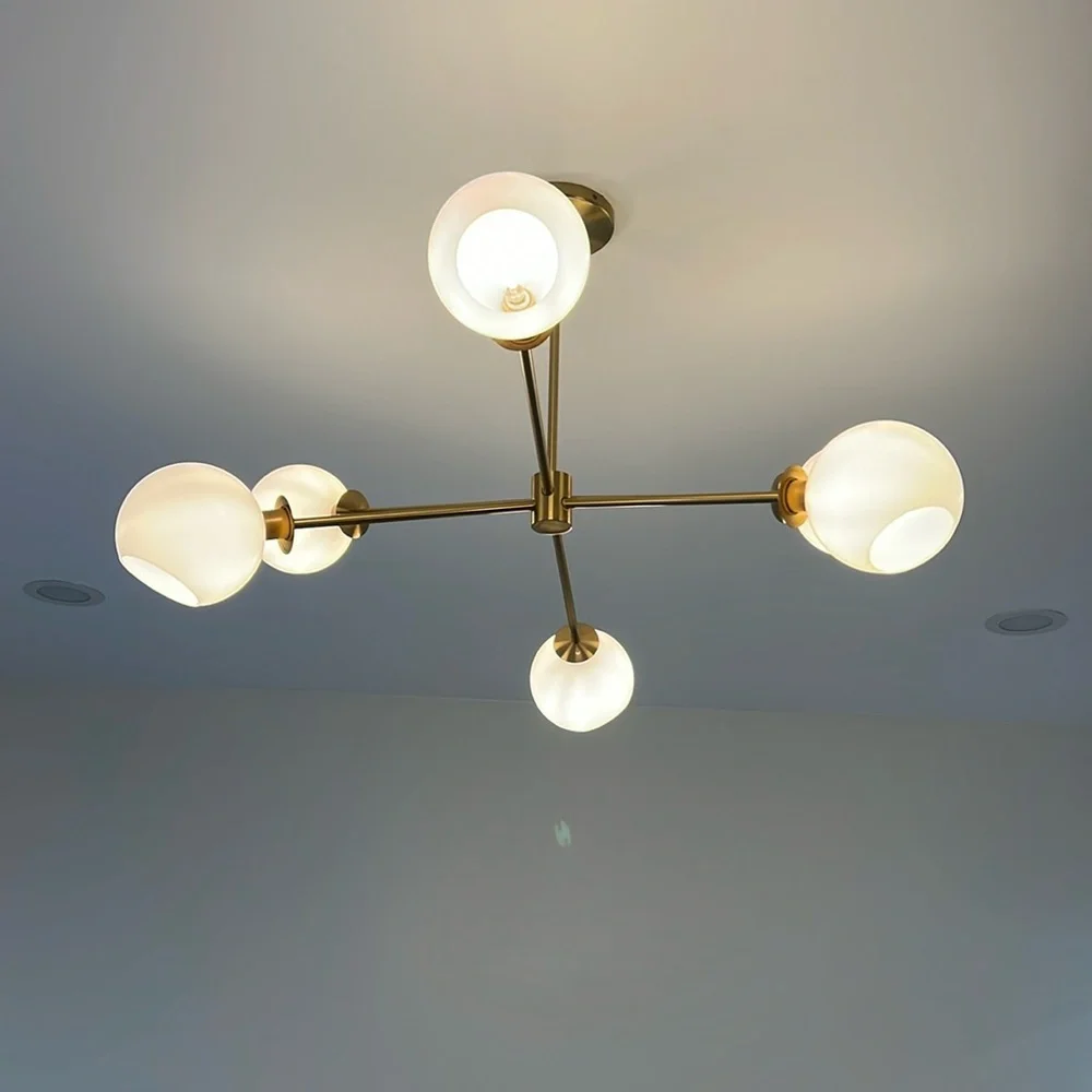 This beautiful and chic west elm designer chandelier, comes equipped with bulbs